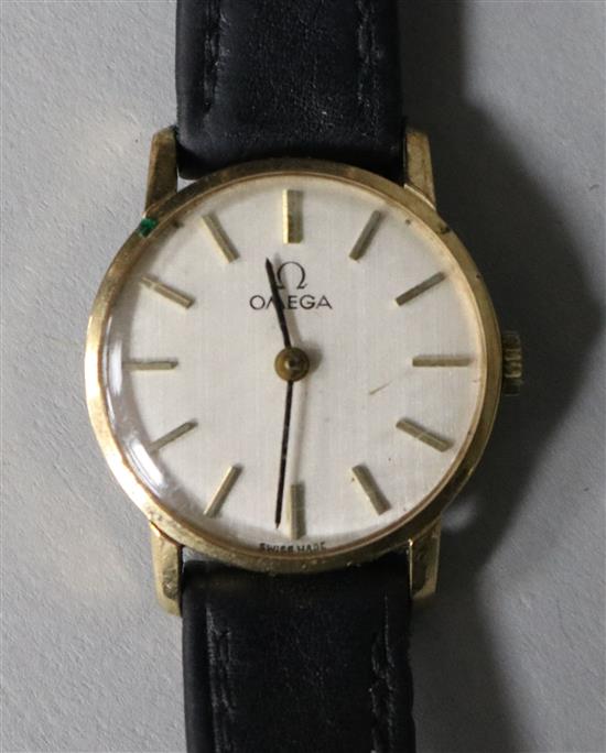 A ladys 9ct gold Omega manual wind wrist watch.